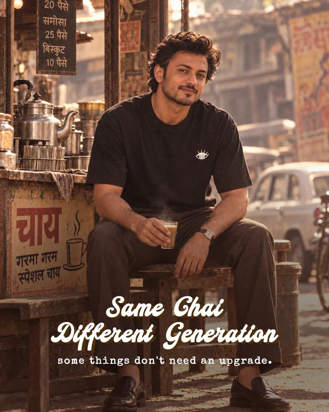 A YAWI social post, Same chai, different generation: a model in a black YAWI tee at a tea stall.