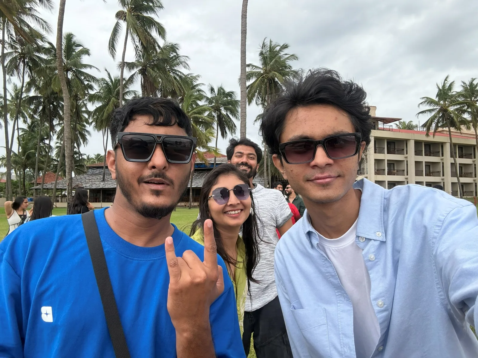 Three teammates taking a selfie at the resort